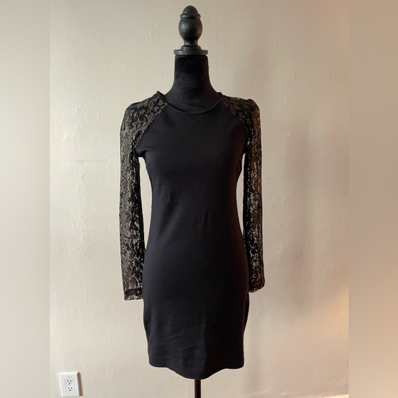 Petticoat Alley Dresses & Skirts - Petticoat Alley, Black/Gold form fitting dress,w/lace sleeves, size med